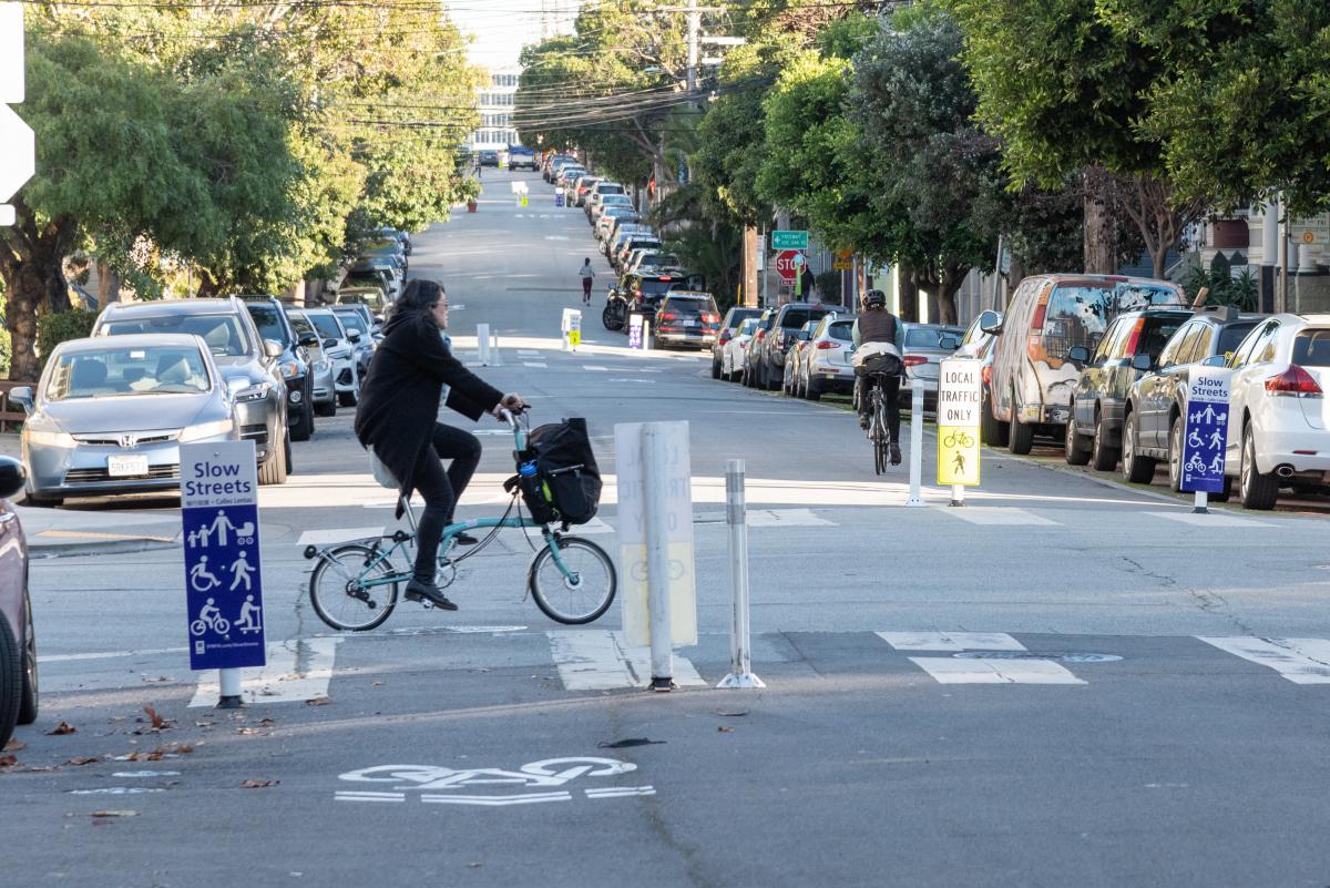 Cyclists navigate Page Slow Street, shown here as an example Slow Street.