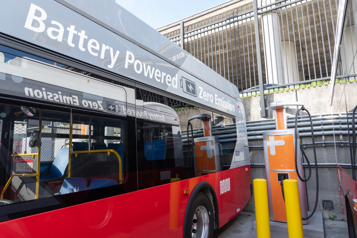 Battery electric bus by charging dispenser