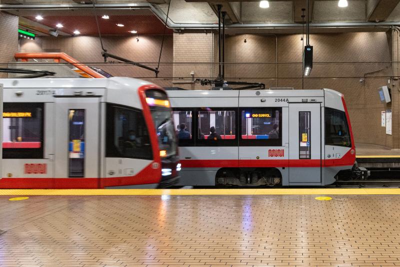 Two Light Rail Vehicles at a Station Platform