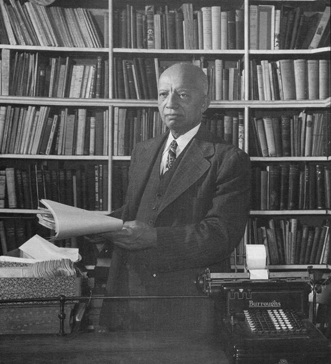 Image of Dr. Carter G. Woodson in his library, 1948. NMAH, Smithsonian Institution
