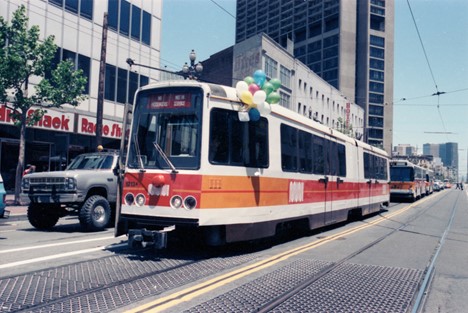 Muni’s first generation of LRV on the surface of Market Street at 11th Street from the 1984 Trolley Festival. 