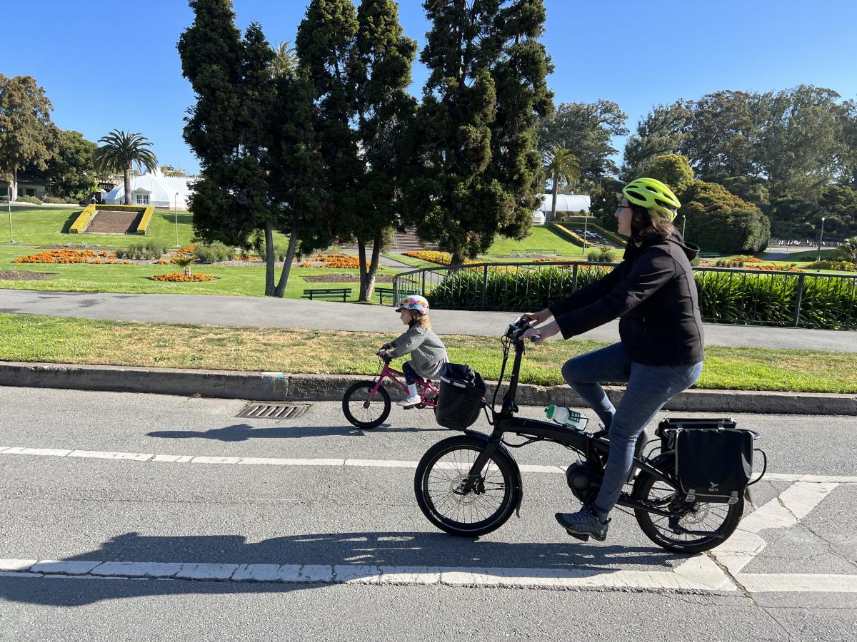 Laura Stonehill and family riding in Golden Gate Park 