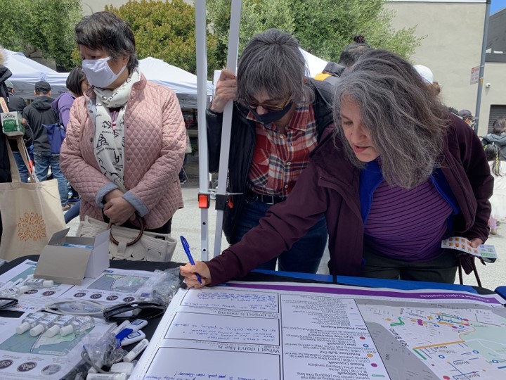 Community members providing their feedback at an in-person event