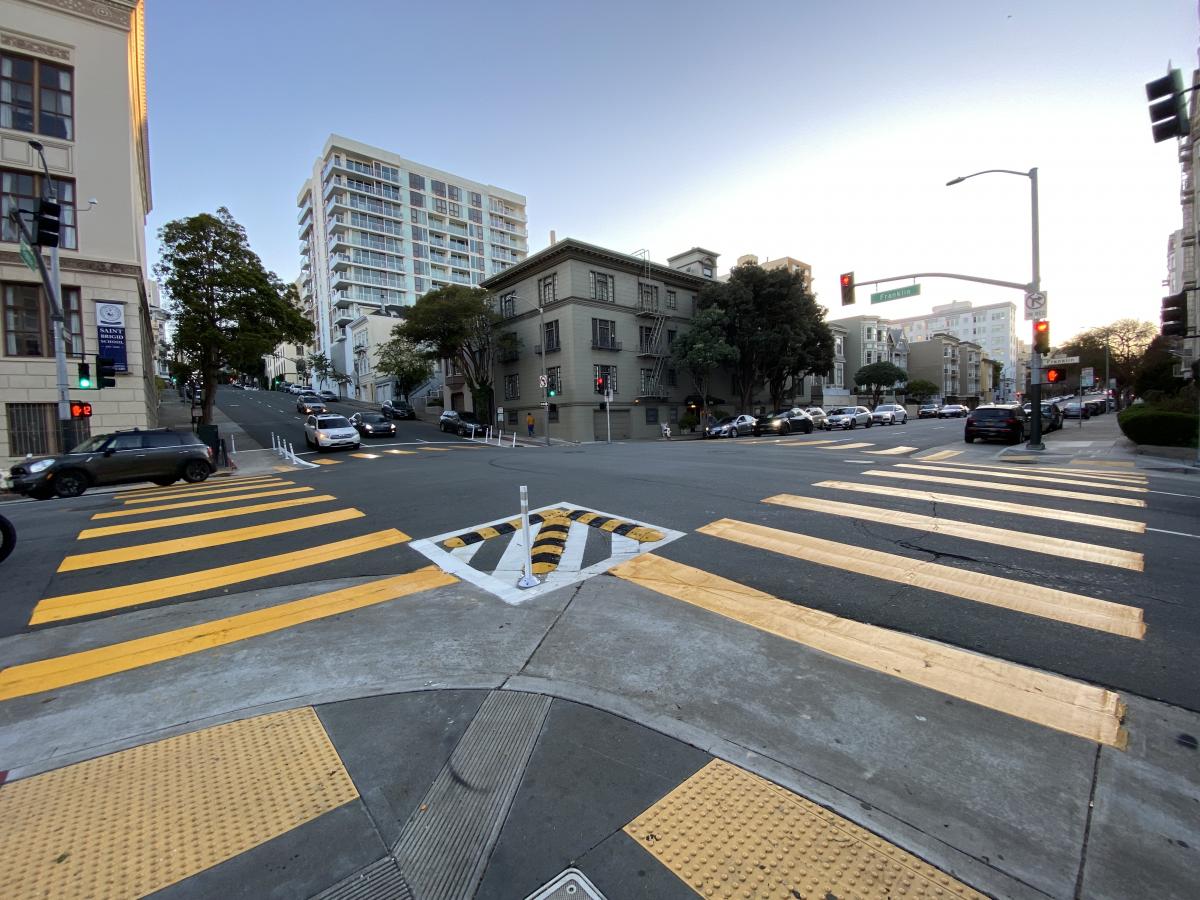 A slow-turn wedge at the intersection of Franklin and Broadway implemented as part of the Franklin Street Quick-Build Project