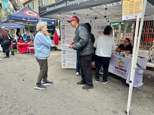 MY-T team -- MEDA, YCD, TCDC -- tabling at Fiesta de las Americas