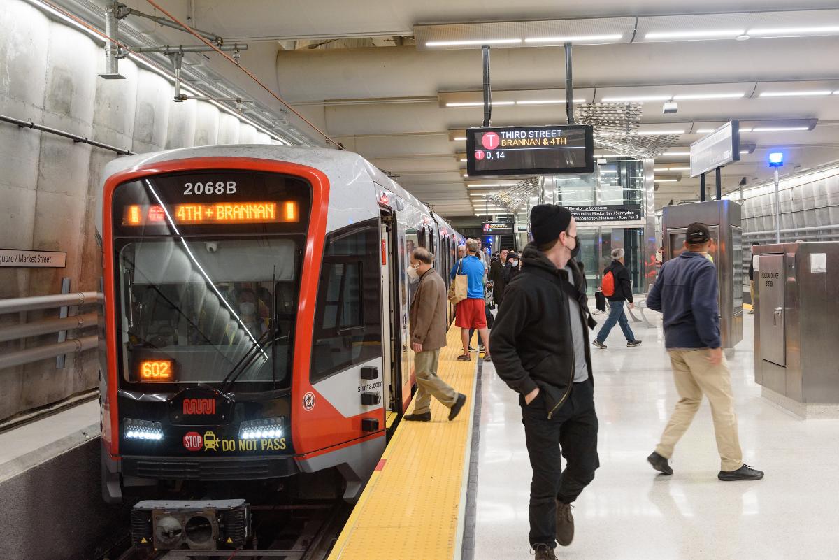 People getting on and off the light rail train at the new Union Square Station of the T-Third Central Subway on opening day of free weekend shuttle service.