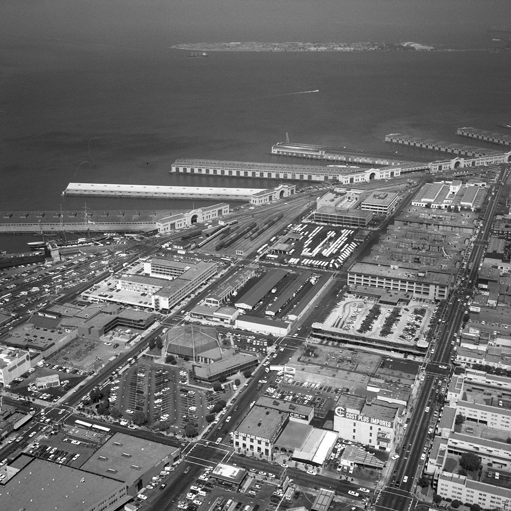 Aerial black and white shot of Kirkland Yard near San Francisco piers. We see the SF Bay and part of Treasure Island.