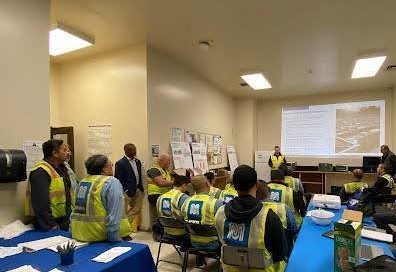 FMTA and Project staff presenting updates to front-line workers at the yard. 