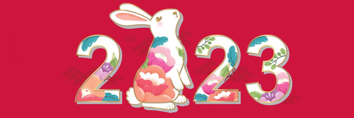 Red banner with the year "2023" in which the "0" is a rabbit. Also includes pretty watercolor flowers.