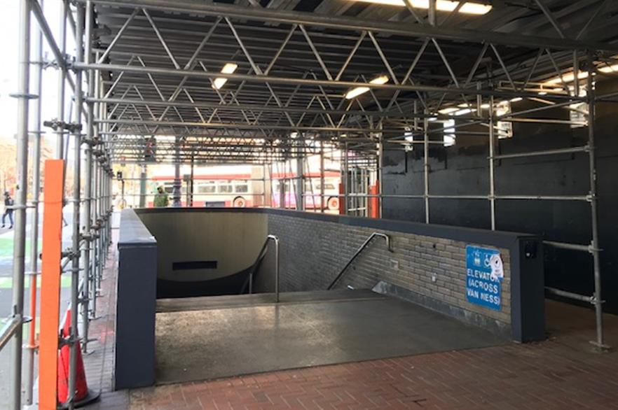 Picture of Van Ness Station entrance surrounded by scaffolding