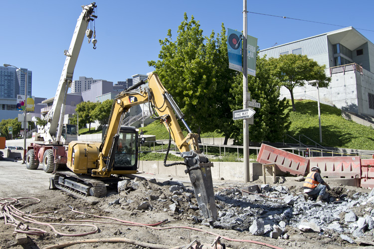 Demolishing guide walls at 4th and Folsom