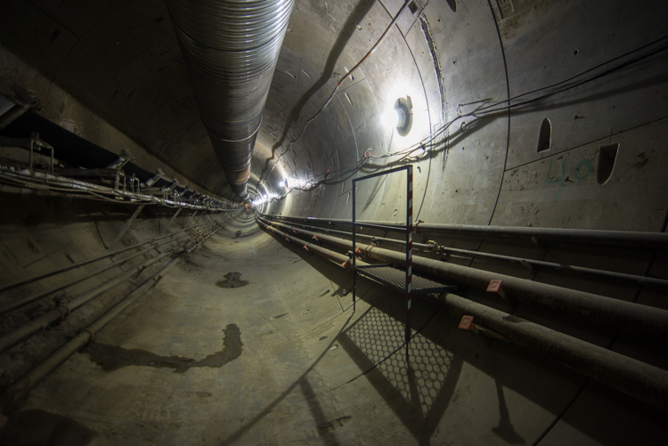 As TBM Mom Chung moves forward, the tunnel grows longer. The 350-foot machine is currently beneath 4th and<br />
    Howard.