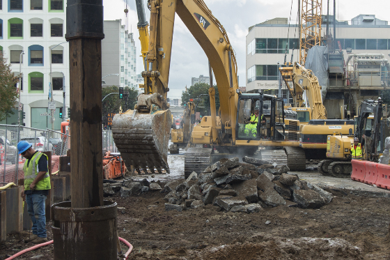 An excavator is being<br />
        used to excavate the roadway at the future Yerba Buena/Moscone Station.