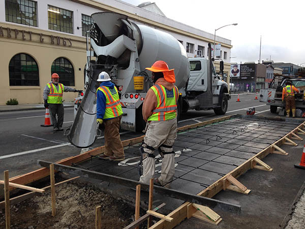 Construction of a bus boarding island during Phase 1 of the 8th Street Safety Project