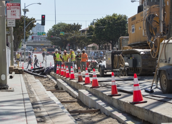 Construction crews are<br />
        building walls.