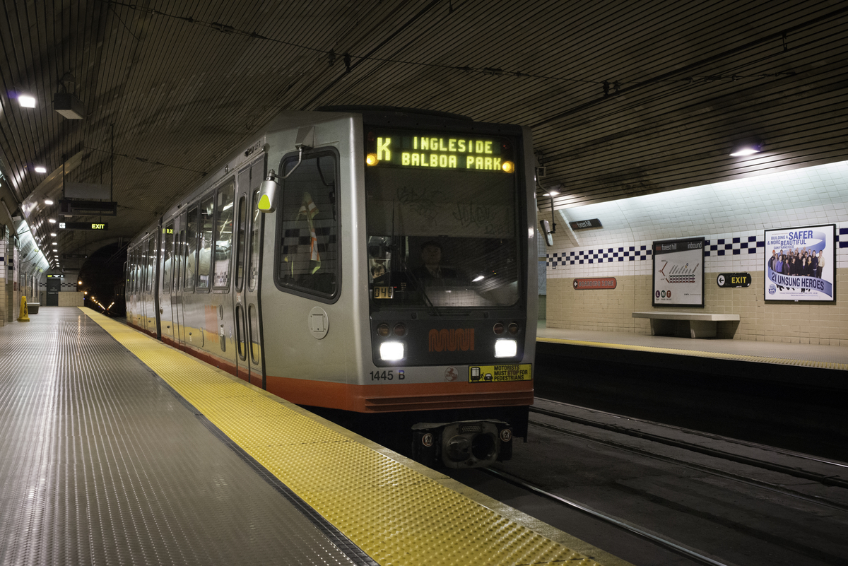 K Ingleside modern gray and red streetcar at the Forest Hill Station.