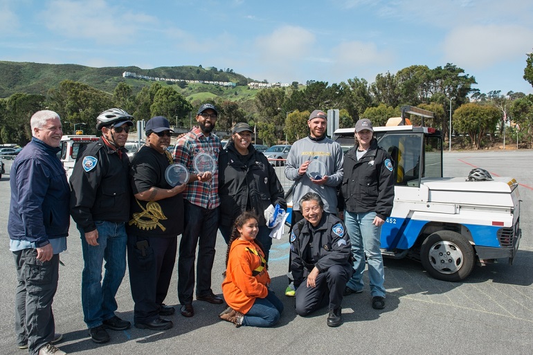 PCO division participants and judges stand with the winners.