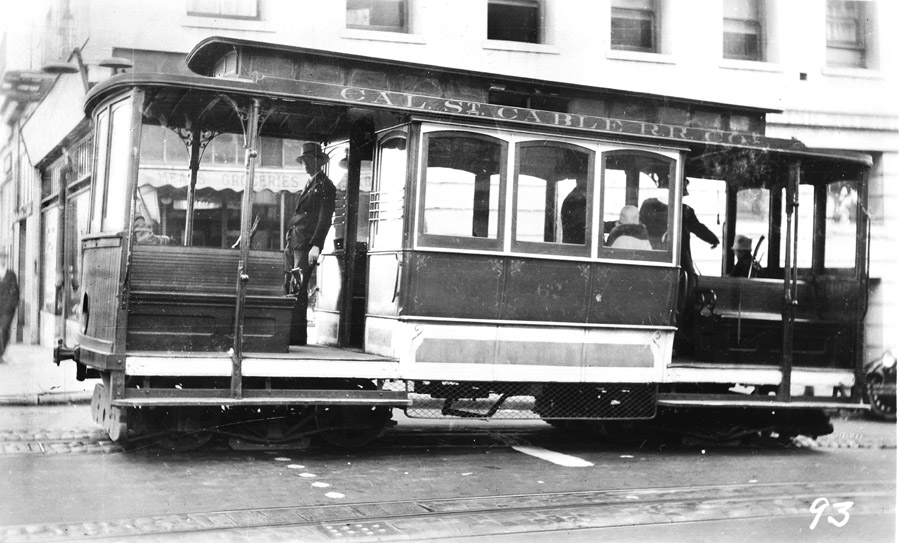 black and white photo from 1927 showing California Street Cable Railroad Company car 62 on Jones and O'Farrell Streets.