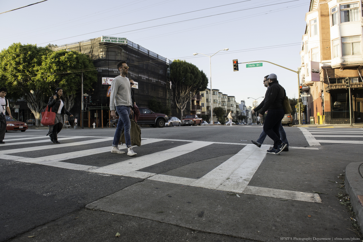 Zebra-striped crosswalks welcome pedstrians at 16th and Guererro.