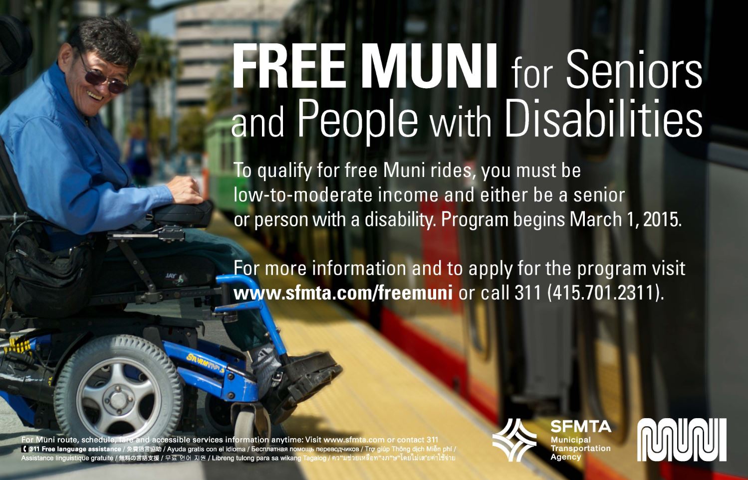 Man in electric wheelchair smiles as he enters Muni train waiting at platform