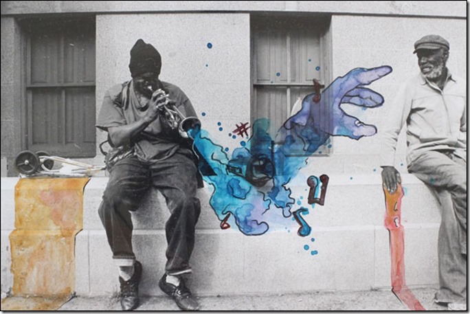 Black and white photo of a building with a with two men sitting on a ledge. One of them is playing a trumpet. A blue and purple hand has been painted coming from the trumpet. Red and yellow are painted on the side of the building.