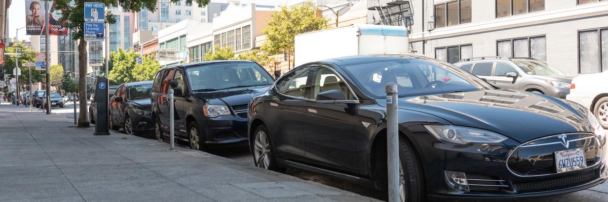 The City's New Multi-Space Paystation with parked cars