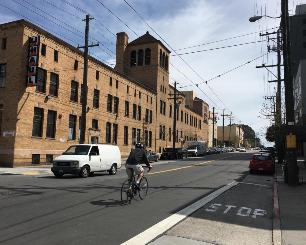 Bryant Street before: a bicyclist travels along southbound Bryant street