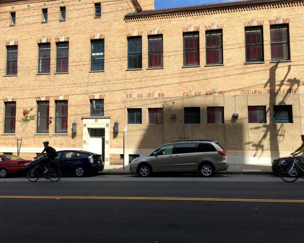 Bryant Street before: two bicyclists travel along northbound Bryant Street