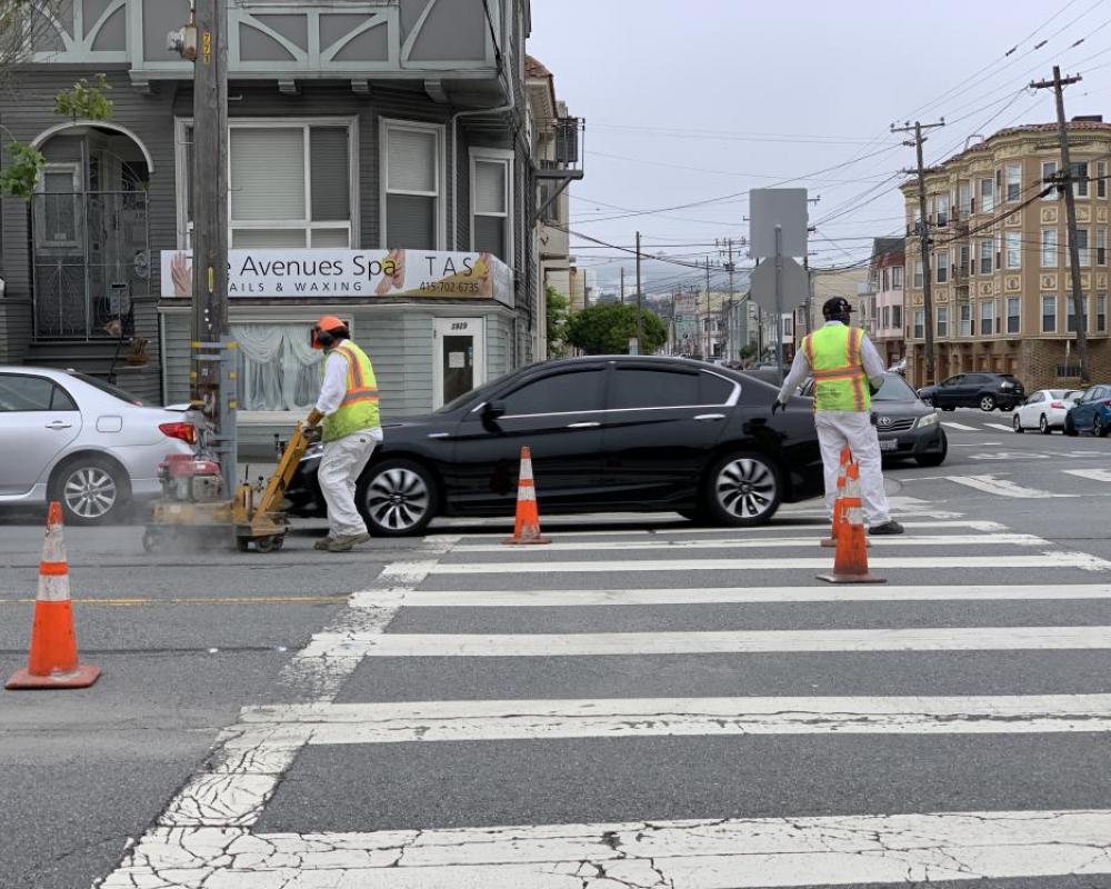 Paint Shop starting to put in new lines on California Street