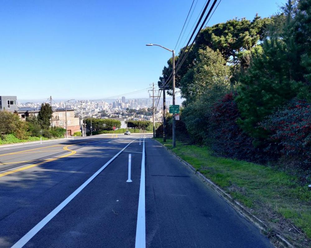 Clipper Street looking downhill with protected bikeway