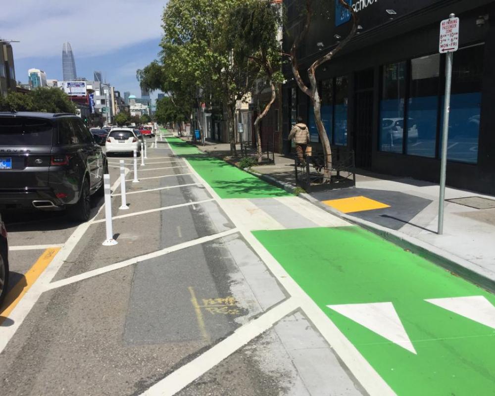 Protected bike lane on Folsom near 8th Street (2018 near-term improvements)