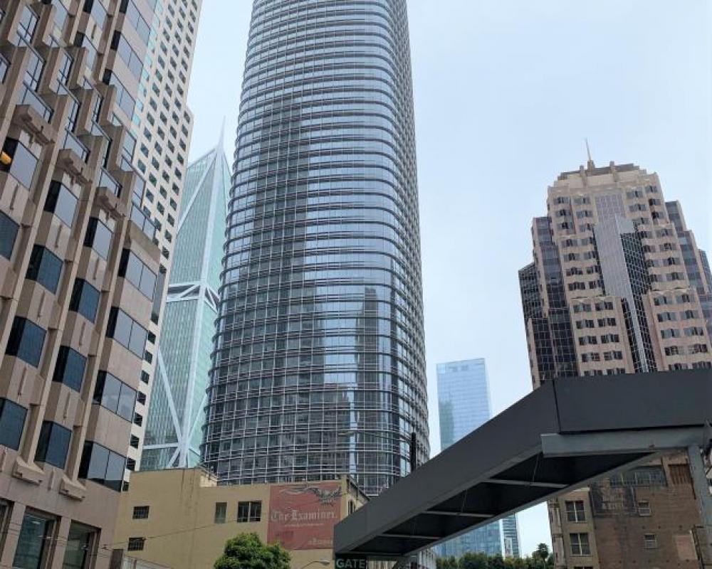 View of Salesforce Tower looking south from 1st Street, with construction at the Oceanwide Center at 50 1st Street