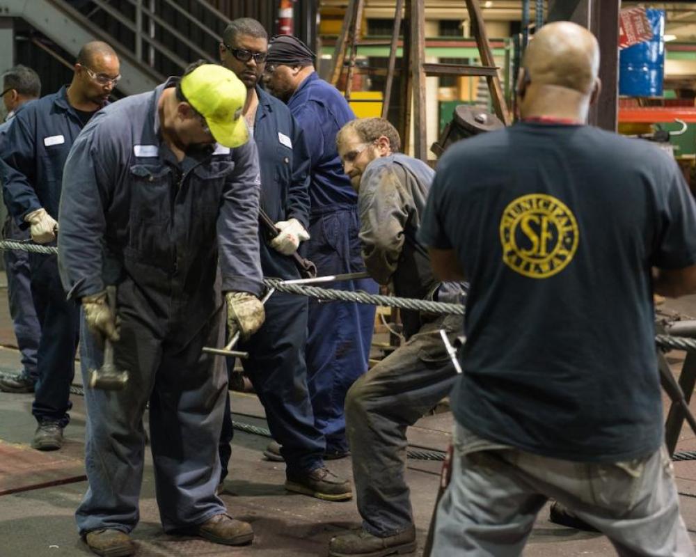 workers splicing a cable