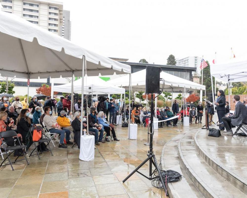 Executive Director Tilly Chang of the San Francisco County Transportation Authority makes remarks to a crowd of people