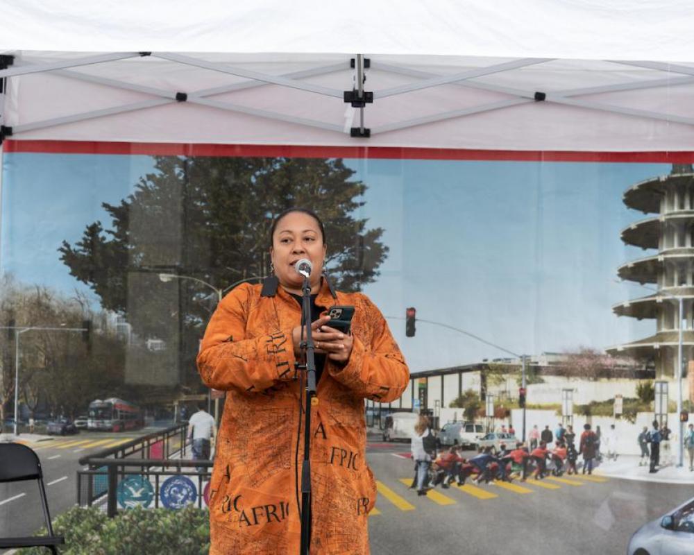 Utopia Hammond recites spoken word at the post-ceremony community celebration