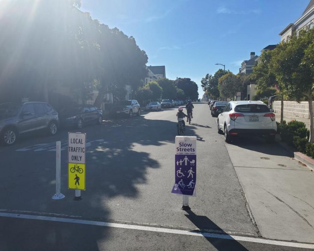 Kids biking on a slow street