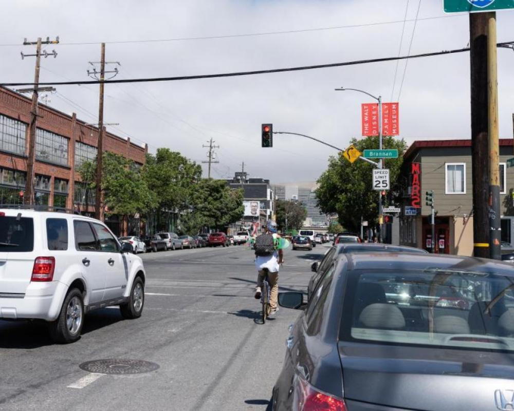 7th Street before: bicyclist riding in faded bike lane