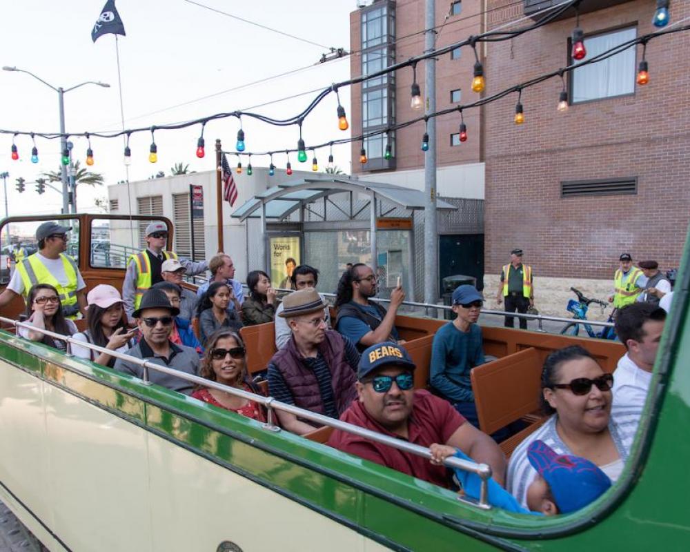 Passengers riding Muni's boat tram