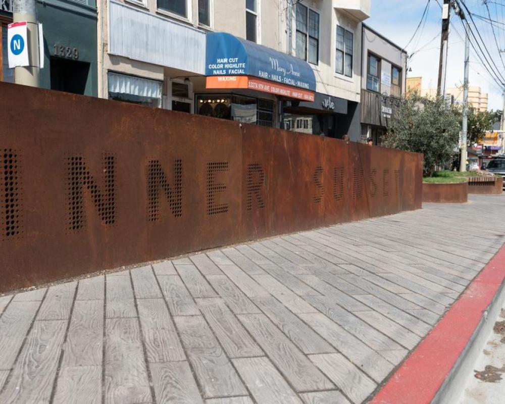 Wall of the parklet on 9th Avenue featuring 2-foot tall lettering that says "Inner Sunset"