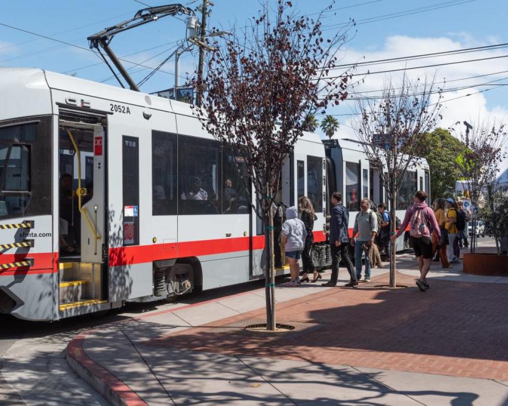 Customers board an N Judah from the bulb out installed as part of the Inner Sunset Streetscape Improvement Project
