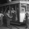 group of men with streetcar