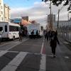 Photo of shuttles blocking and loading in the Townsend bike lane and no sidewalk for pedestrians - November 2016