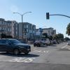 Image of car turning onto Commonwealth at Geary, with new traffic signal in the background