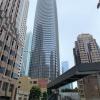 View of Salesforce Tower looking south from 1st Street, with construction at the Oceanwide Center at 50 1st Street