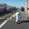 Photo of crew painting new safety striping on Taraval Street