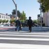 Photo of people walking across the new crosswalk