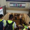 Photo of interns listening to presentation by STMFA staff in stairwell.