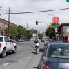 7th Street before: bicyclist riding in faded bike lane