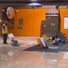 Custodians from Buildings and Grounds make the floor shine at Castro Station