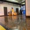 MOW employees clean out a mechanical room at Montgomery Station 
